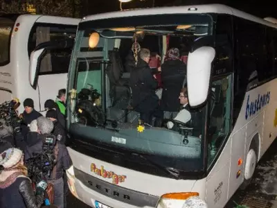 Angry German Town Sends Refugee Bus To Chancellor Merkel's Office
