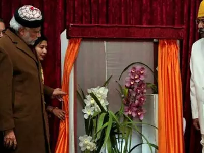 Narendra Modi Goes To Assam To Attend A Meet, Gets A  Flower Named After Him