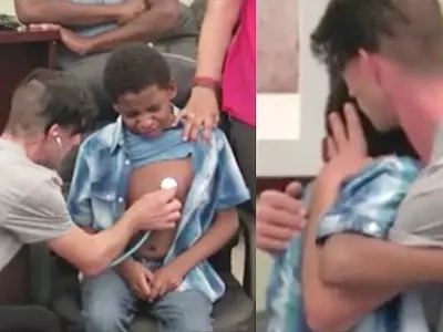 Heartwarming Moment Shows Father Listening To His Daughter's Heart Inside A Boy After Transplant