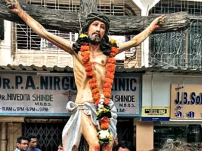 People Rush To Collect 'Holy Water' From Seeping Feet Of Jesus Christ's Statue In Mumbai