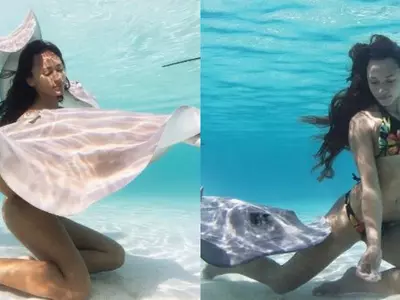 Model Swims Naked With Deadly Sea Creatures Underwater, But Never Gets Bit As She's Their Queen
