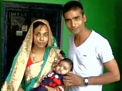 PM Calls Up Mirzapur Couple, Christens Baby