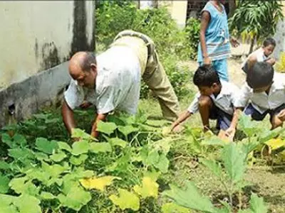 He Crawls To School Every Day. This Teacher Hasn't Taken Salary For 18 Years