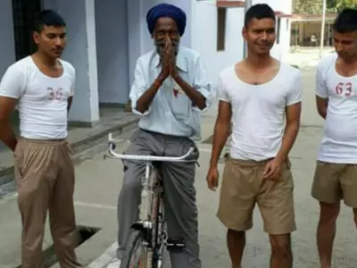 UP trainee cops gift new bicycle to elderly hawker