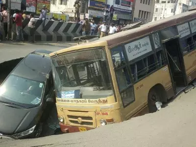 Bus and Car Trapped As Chennai Road