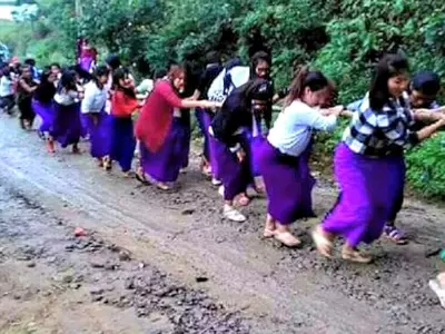Manipur school girls drag out stuck bus by forming human chain