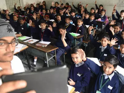 Teachers Are Taking Selfies With Students In UP Government Schools. Here's Why.