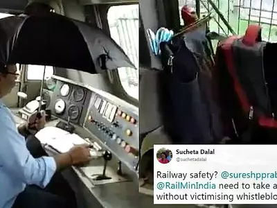 Driver Pilots Train With An Umbrella In Hand To Prevent Getting Wet Due To A Leaky Roof!