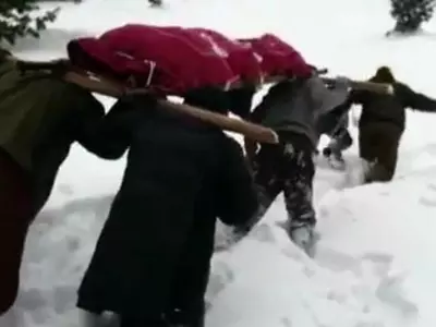 A Soldier Carried His Mother's Dead Body For 10 Hours Through Kashmir Snow To Lay Her To Rest