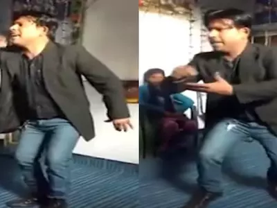Watch This Hilarious Video Of A Man Singing And Dancing In Class While Teaching Kids English!
