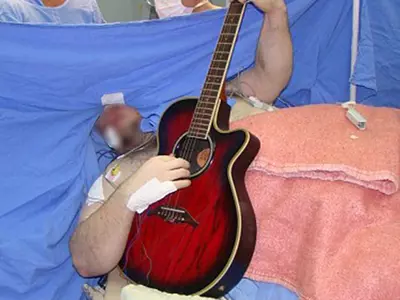 Playing Guitar In Operation