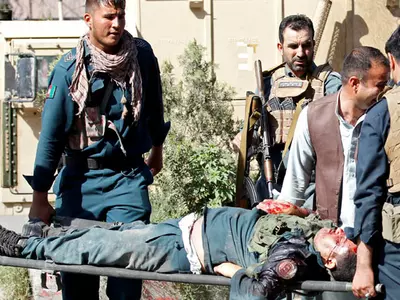 At Least 20 Afghan Policemen Killed In Taliban Ambushes