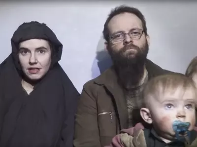 Caitlan Coleman and Joshua Boyle with their children
