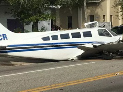 Small Plane Crashes On Busy Road, Strikes Two Cars