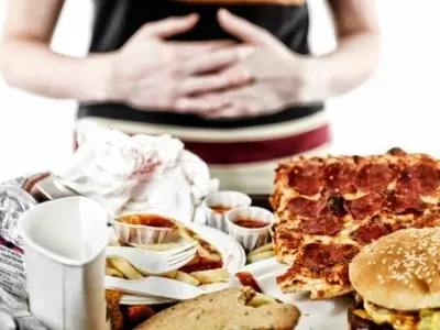 Here's How To Get Back On Track After A Food Binge