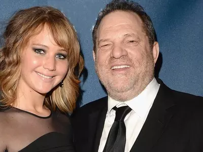 Harvey Weinstein and Jennifer Lawrence,