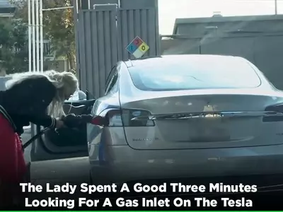 Tesla, Electric Vehicle, Electric Car, Tesla Gasoline, Woman Pouring Gas In Tesla, Technology News,