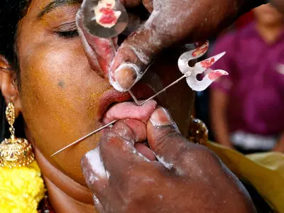 Woman Sacrifices Tongue To Lord Shiva In Temple
