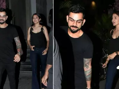 A picture of Virat Kohli and Anushka Sharma colour-coordinating for a romantic dinner date.