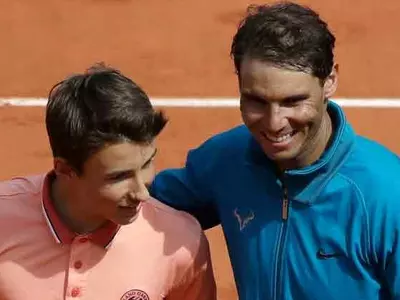 Rafael Nadal Rallies With A Ball Boy After Entering Pre Quarters