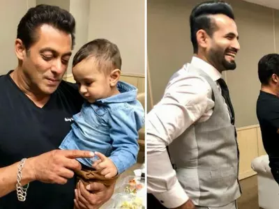 A picture of Salman Khan playing with Irfan Khan's son Imran.