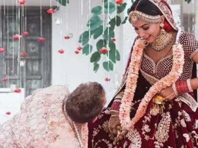 husband touches wife's feet, Indian wedding, mutual respect, husband touches wife's feet in wedding