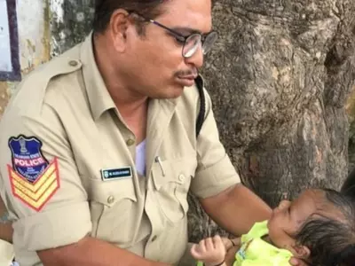 telangana cop with baby