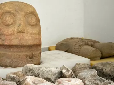 Mexico temple, priests wearing dead skin, flayed Lord,  Xipe Totec, University of Florida, archaeolo