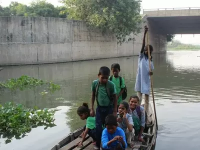 National Human Rights Commission, bridge, slum children, Gujarat, swimming to school