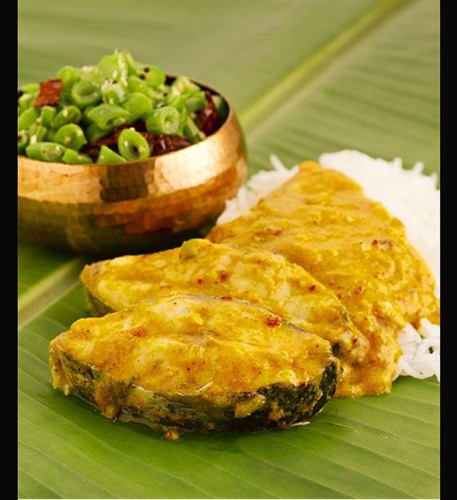 Steamed fish in banana leaves