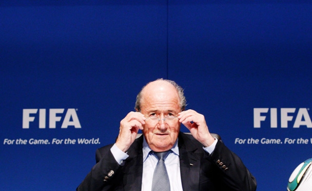 Blatter faces calls to resign in racism furor
