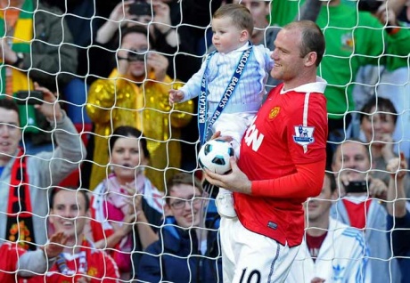 Man U striker Rooney's son Kai is a Barcelona fan!