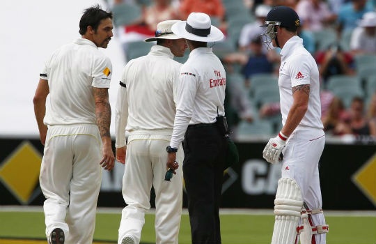 Mitchell Johnson (L) and captain Michael Clarke (2nd L) speak to England's Ben Stokes after Johnson collided while Stokes was running between wickets during the fourth day's play. (Photo: Reuters)