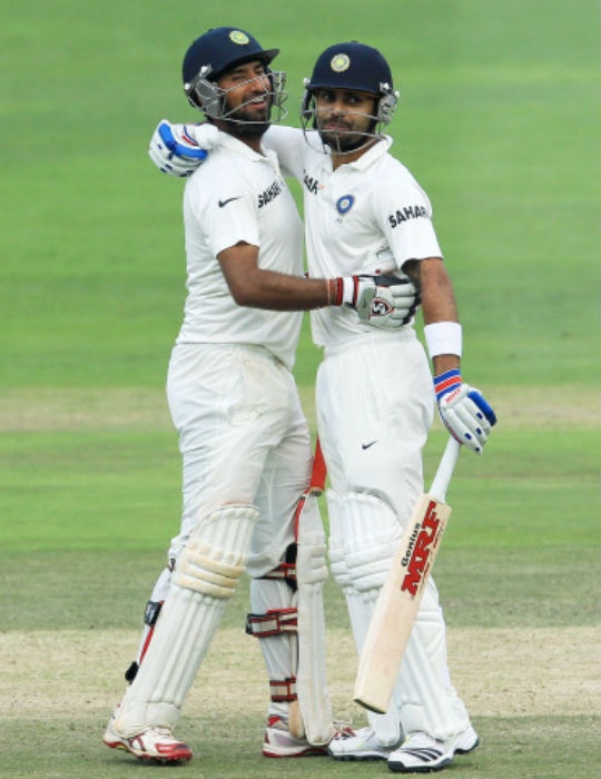 Cheteshwar Pujara (left) and Virat Kohli added an unbeaten 191 for the third wicket on Day Three. (Photo: AP)