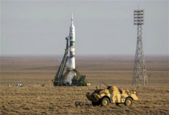 Soyuz Flies Olympic Torch to Space