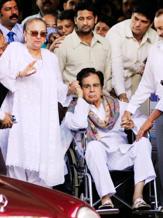 After spending 11 days in hospital actor Dilip Kumar was discharged on Thursday afternoon.  The 90-year-old living legend of Hindi cinema received a grand welcome as he exited Mumbai’s Lilavati hospital on a wheel chair along with his wife Saira Banu.