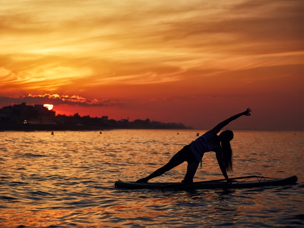 Improve Your Strength With Stand Up Paddleboard Yoga