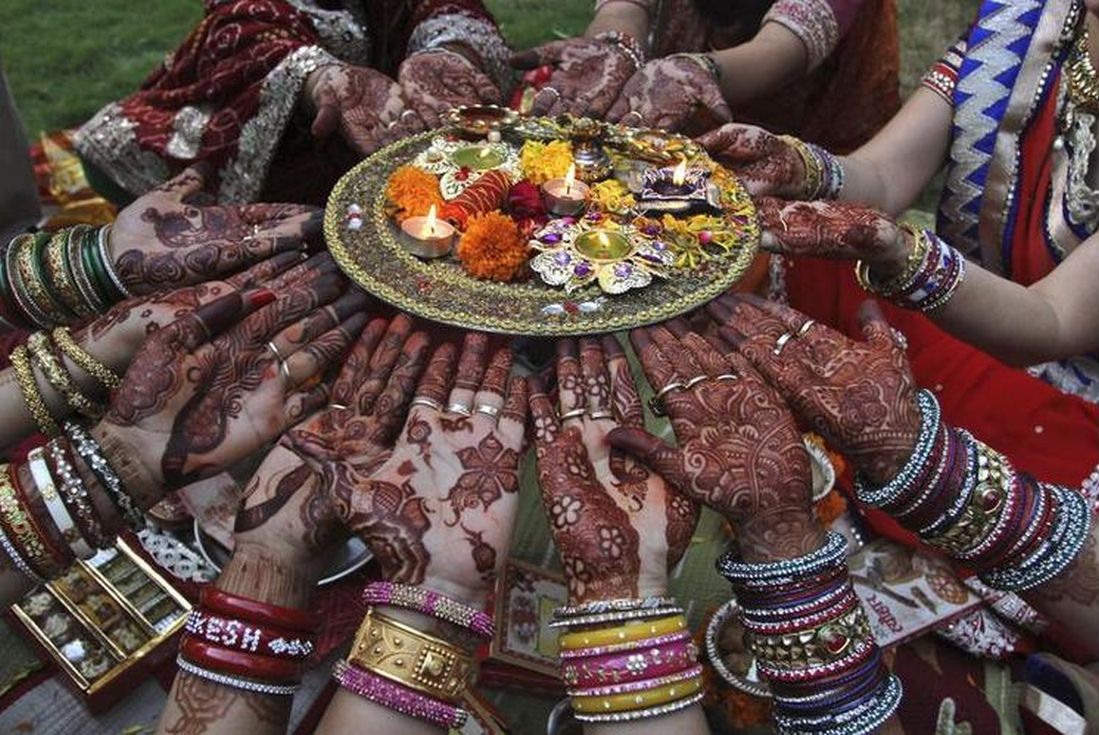 married women perform rituals on Karva Chauth 