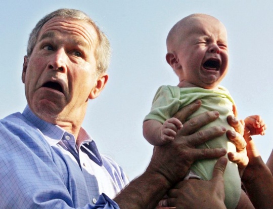 George W Bush with a crying baby
