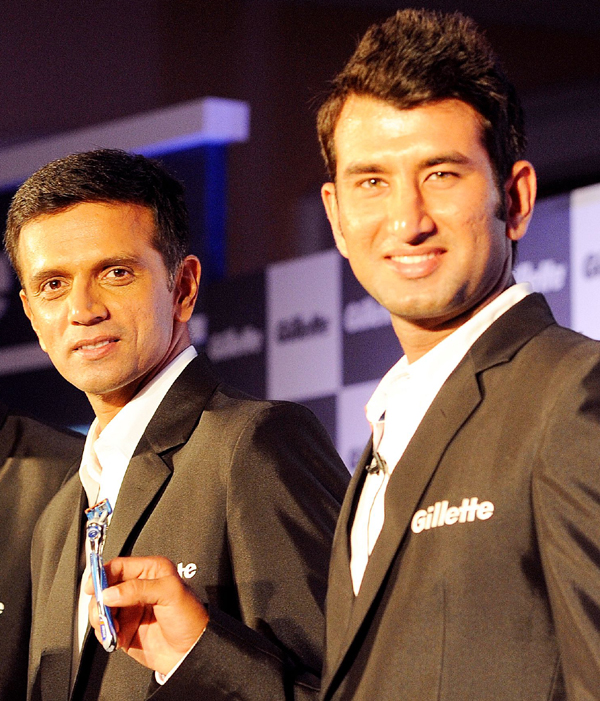 Dravid and Pujara at a promotional event