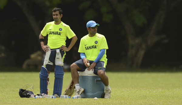 Gambhir and Dhoni during a practice session in 2012