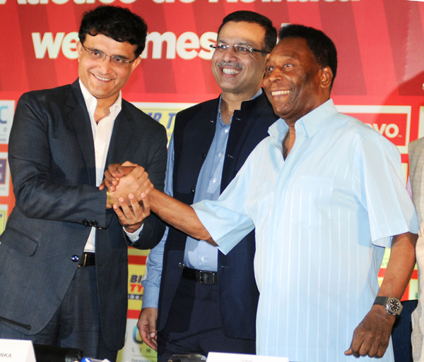 Sanjiv Goenka with Sourav Ganguly (left) and football great Pele (right)