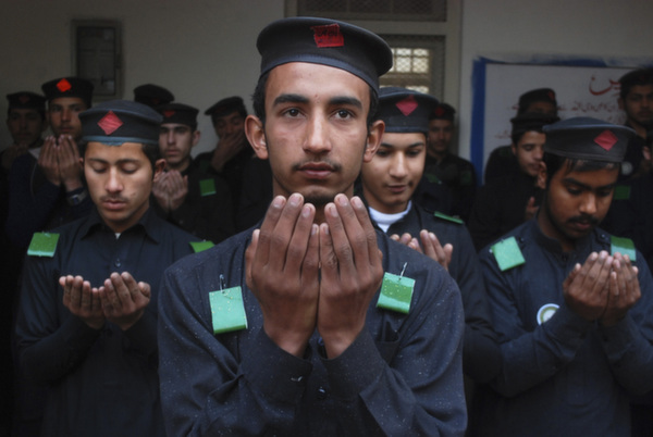 students praying peshawar