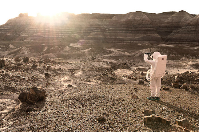 Greetings From Mars features photos where Julien pretends to visit Mars as a tourist