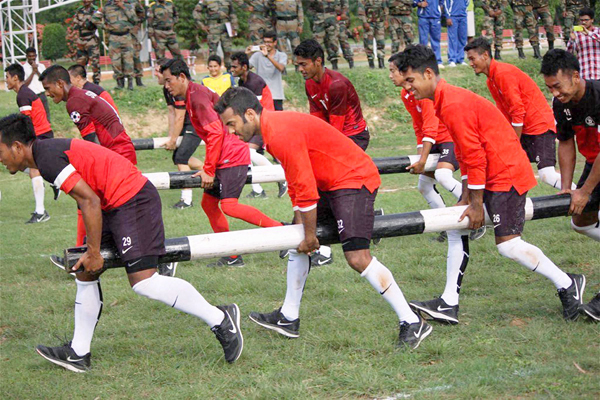 Indian footballers being trained by army officers