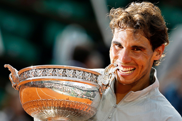 Nadal with the 2014 French Open trophy