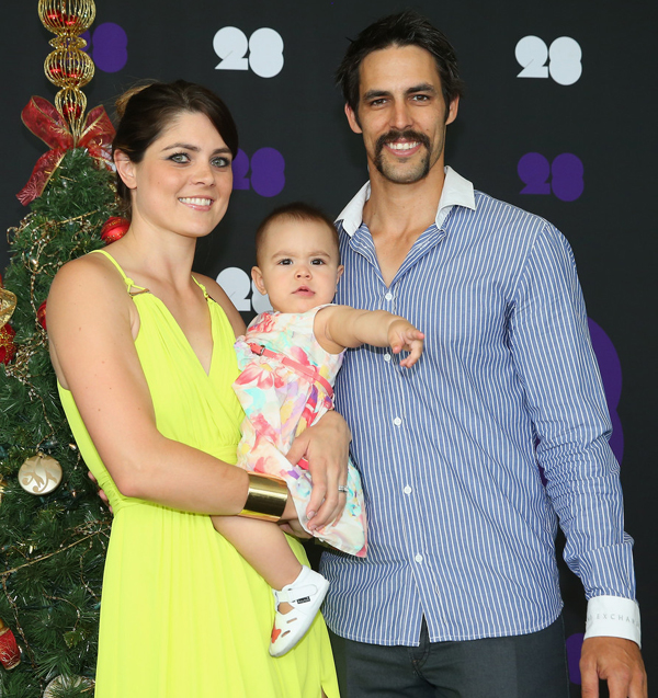 Mitchell Johnson with wife and daughter