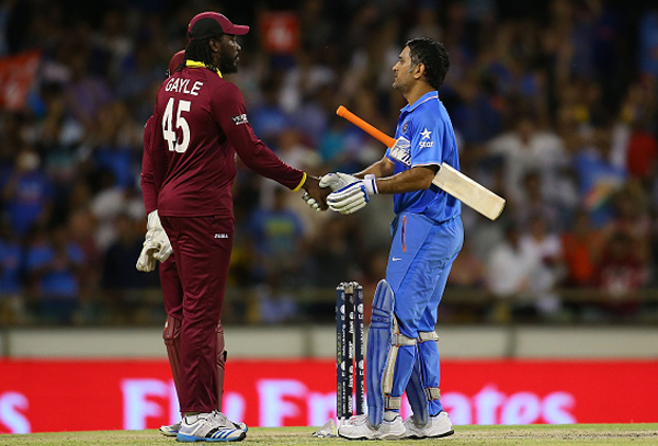 Dhoni and Gayle after the match