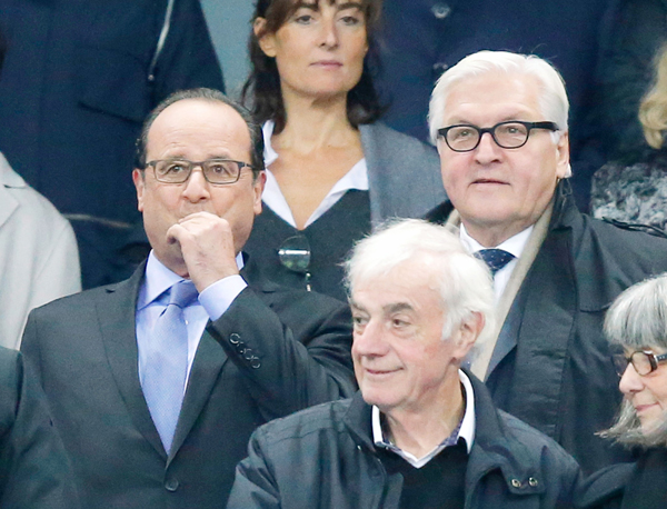 Francois Hollande, left, and German Foreign Minister Frank-Walter Steinmeier