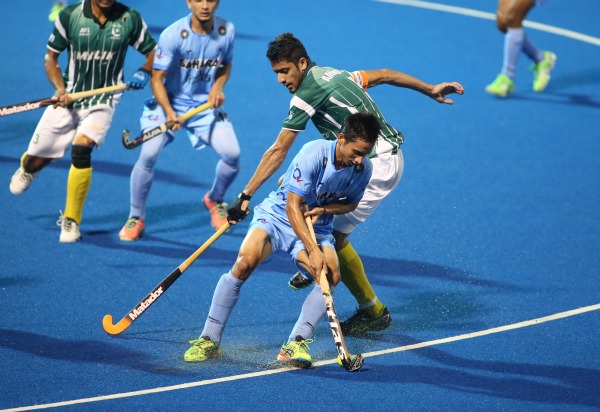 Players vying for the ball during Junior Asia Cup final